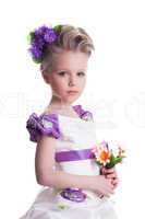 Beautiful little girl with bouquet