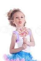 Funny little girl with lollipop