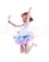 Happy little girl with lollipop jumping