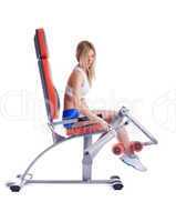 Blonde young woman ajustment exerciser isolated