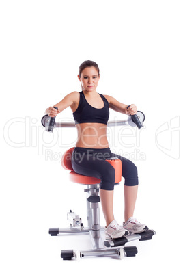 Brunette young woman on orange exerciser