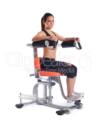 Brunette young woman on exerciser