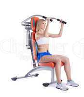 Athletic young woman on isodynamic exerciser