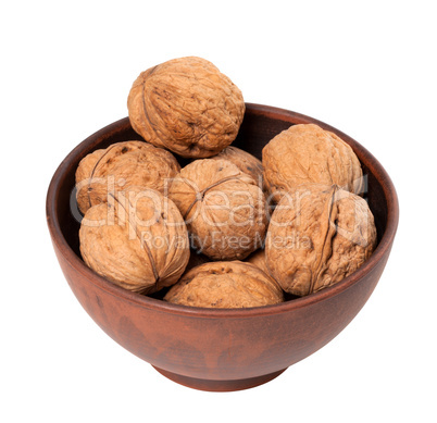 Walnuts in ceramic bowl
