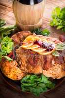 baked turkey with chestnut filling and orange-selective focus