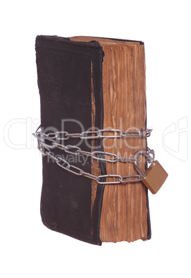 old historic prayer book protected with padlock and chain