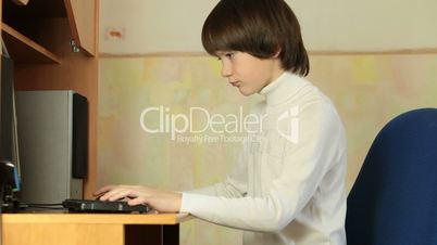 Child Deep in Desktop Computer Game