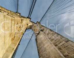 New York City. Magnificent view of powerful Brooklyn Bridge stru