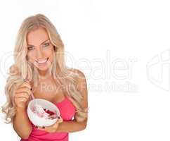 Attractive fit young woman eating ice cream