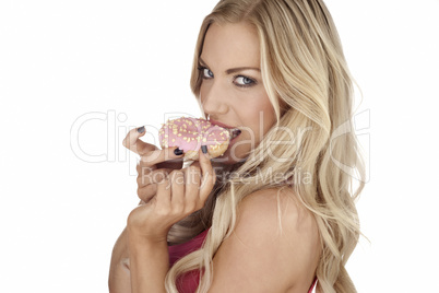 Woman eating a delicious donut
