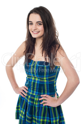 Attractive young girl with hands on waist