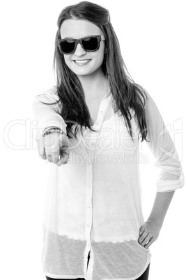 Stylish teen girl wearing goggles, indicating forward