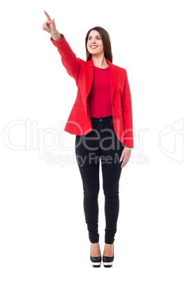 Confident corporate lady pointing at something