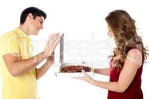 Picture of happy romantic couple with pizza