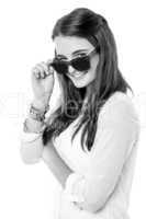 Fashion girl adjusting her shades
