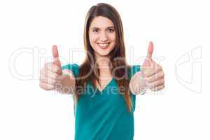 Lovely female gesturing double thumbs up