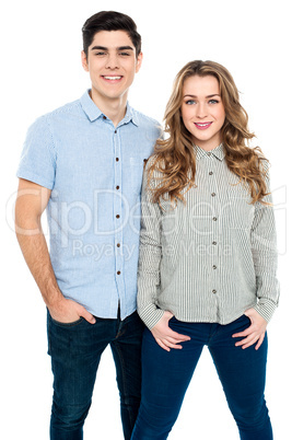 Trendy young couple posing in style