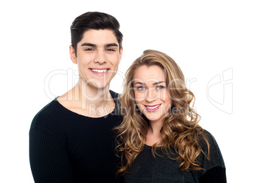 Cheerful young couple standing