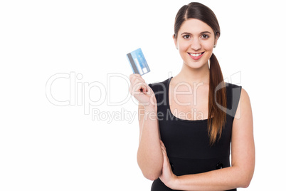 Attractive woman displaying her credit card