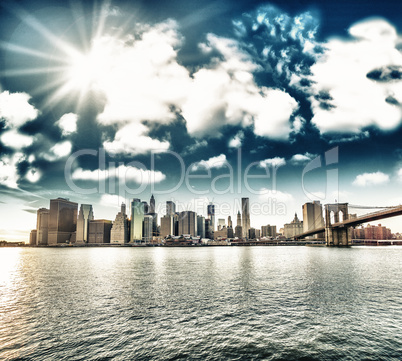 New York City. Wonderful sunset view of Brooklyn Bridge and Manh