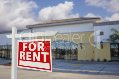 Vacant Retail Building with For Rent Real Estate Sign