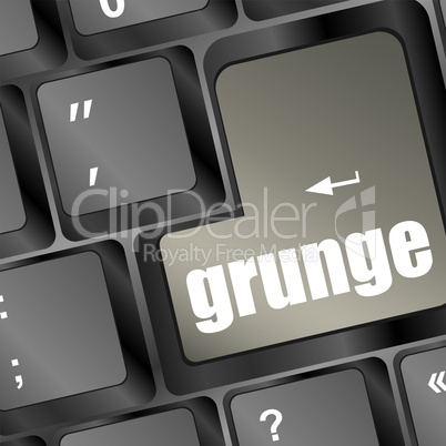 Computer keyboard with grunge word on enter button