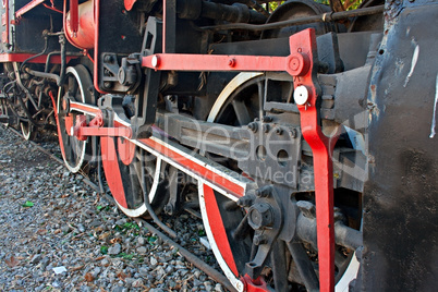 Wheels of a very old steam engine