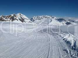 Ski slope, ski lift and Sanetsch Pass