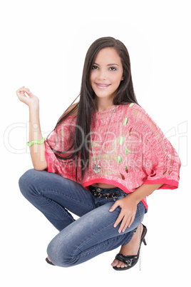 Young brunette woman wearing a jeans isolated on a white backgro