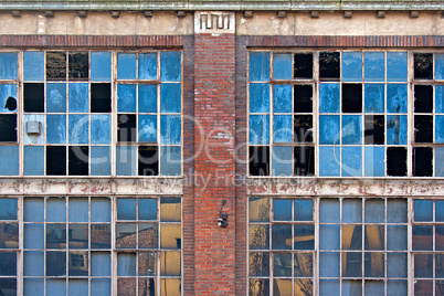 Broken windows on old derelict building