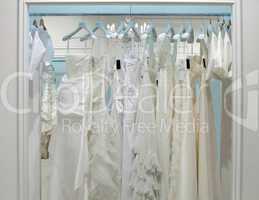 Collection of wedding dresses in the shop