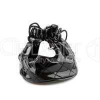 Black bag isolated on a white background with silver heart penda