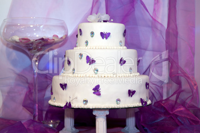 Wedding cake with purple butterflies