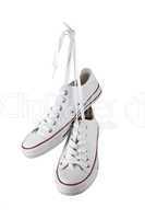 Pair of new white sneakers isolated on white