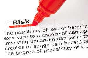 Risk underlined with red marker