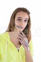 Teenage girl with skeleton face paint