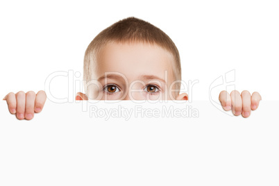 Child holding blank placard