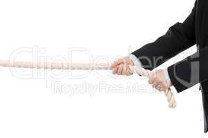 business man hand holding or pulling rope