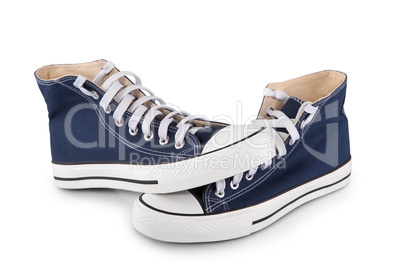 Pair of new blue sneakers on white background
