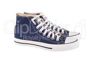 Pair of new blue sneakers on white background