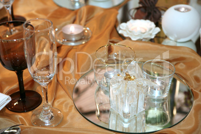 Elegant table with candles and glasses