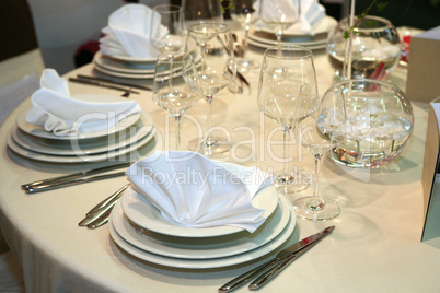 table setting in beige for elegant dinner