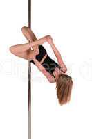 Young woman exercising pole dance fitness