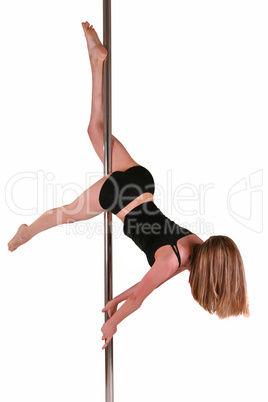 Young woman exercising pole dance fitness