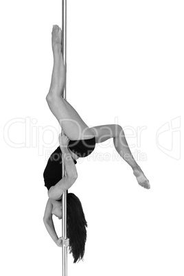 Young woman exercising pole dance fitness