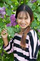 Beautiful Thai woman with braces in the park