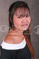 Thai girl with braces on her teeth