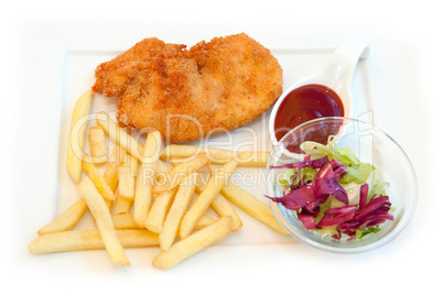 Fried chicken with french fries, ketchup and salad