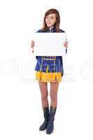 Teen majorette holding blank white paper