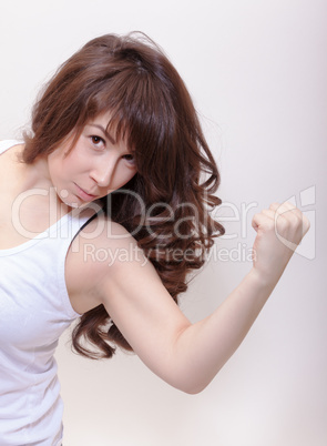 Attractive woman making a fist